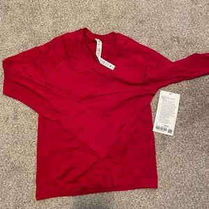 Swiftly Tech LS 2.0 race shirt fits slightly small red size 6